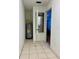 Laundry area with water heater and access to another room at 13660 Se 80Th Ave, Summerfield, FL 34491