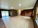Open living space with access to pool and stairs at 13660 Se 80Th Ave, Summerfield, FL 34491