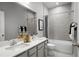 Bathroom with double sinks, tub and shower at 1912 Quail Fields Cir, Winter Haven, FL 33884