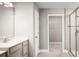 Bathroom with single vanity, shower, and closet at 1912 Quail Fields Cir, Winter Haven, FL 33884