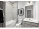 Clean bathroom with bathtub, shower, and vanity at 1912 Quail Fields Cir, Winter Haven, FL 33884