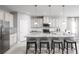 Modern kitchen with granite countertops and stainless steel appliances at 1912 Quail Fields Cir, Winter Haven, FL 33884
