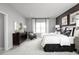 Main bedroom with king-size bed and calming decor at 1912 Quail Fields Cir, Winter Haven, FL 33884