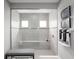 Large walk-in shower with built-in seat at 1912 Quail Fields Cir, Winter Haven, FL 33884
