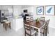 Bright kitchen with granite countertops and stainless steel appliances at 306 Biltmore Blvd, Dundee, FL 33838