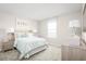 Light and airy bedroom with a light teal comforter at 314 Biltmore Blvd, Dundee, FL 33838