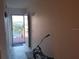 Entryway with access to balcony and tiled floor at 3700 S Atlantic Ave # 405, New Smyrna Beach, FL 32169