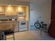 Kitchen with appliances and breakfast bar at 3700 S Atlantic Ave # 405, New Smyrna Beach, FL 32169