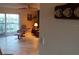 Living room with recliner and patio view at 3700 S Atlantic Ave # 405, New Smyrna Beach, FL 32169