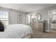 Spacious bedroom with dresser and large window at 3785 Voyageurs Ct, Apopka, FL 32712