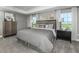 Elegant Primary bedroom with king-size bed and large windows at 3785 Voyageurs Ct, Apopka, FL 32712