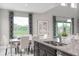Kitchen features an eat-in dining area with large windows at 3785 Voyageurs Ct, Apopka, FL 32712