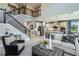 Two-story living room with open floor plan and kitchen views at 3785 Voyageurs Ct, Apopka, FL 32712