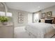 Relaxing bedroom with geometric bedding and neutral tones at 7427 Sw 108Th St, Ocala, FL 34476