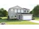 Two-story house with gray siding, two-car garage, and landscaping at 7427 Sw 108Th St, Ocala, FL 34476