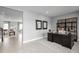 Home office with large desk, shelving, and natural light at 7427 Sw 108Th St, Ocala, FL 34476