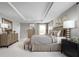 Spacious main bedroom with ample light and dresser at 7427 Sw 108Th St, Ocala, FL 34476