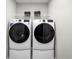 Bright laundry room with washer and dryer at 3042 Aibonito Cir, Clermont, FL 34711