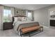 Bright main bedroom with a king bed and en-suite bathroom access at 3744 Sky Mountain Aly, Apopka, FL 32712