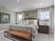 Spacious main bedroom with a king-size bed and an ensuite bathroom at 3744 Sky Mountain Aly, Apopka, FL 32712