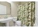 Simple bathroom with a single sink, toilet, and shower at 8320 Sw 82Nd Loop, Ocala, FL 34481