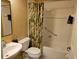 Clean bathroom with shower/tub combo and updated vanity at 8320 Sw 82Nd Loop, Ocala, FL 34481