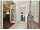 Bright entry hall with view of home office and living room at 8320 Sw 82Nd Loop, Ocala, FL 34481