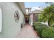 Front entry with brick walkway, and lush landscaping at 8320 Sw 82Nd Loop, Ocala, FL 34481