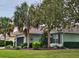 House exterior showcasing a side view with mature landscaping at 8320 Sw 82Nd Loop, Ocala, FL 34481
