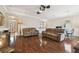 Spacious living room with hardwood floors and comfortable seating at 8320 Sw 82Nd Loop, Ocala, FL 34481
