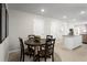 Dining area with a round table and four chairs at 2302 Incandescent Way, South Daytona, FL 32119