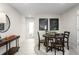 Dining area with round table, chairs, and access to exterior at 2302 Incandescent Way, South Daytona, FL 32119