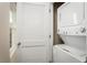 Stackable washer and dryer in a small laundry closet at 2302 Incandescent Way, South Daytona, FL 32119