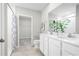 Elegant bathroom with double vanity and shower at 281 Tahiti Rd, Lady Lake, FL 32159