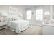 Charming bedroom with light and airy decor at 281 Tahiti Rd, Lady Lake, FL 32159
