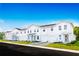 Brand new townhouses with two-car garages and landscaped yards at 281 Tahiti Rd, Lady Lake, FL 32159