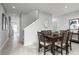 Bright hallway with stairs leading to the second floor at 281 Tahiti Rd, Lady Lake, FL 32159