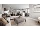 Open-concept living room flows into the kitchen and dining area, perfect for entertaining at 424 Hammock Oaks Blvd, Lady Lake, FL 32159