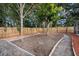 Beautiful backyard featuring a new wooden fence at 1360 10Th Ne Ct, Winter Haven, FL 33881