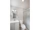 Clean bathroom with a modern vanity, updated fixtures, and glass enclosed shower at 1360 10Th Ne Ct, Winter Haven, FL 33881