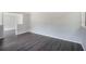 Spacious living room area featuring modern gray walls at 1360 10Th Ne Ct, Winter Haven, FL 33881
