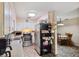 Open kitchen with stainless steel appliances and view to dining area at 5030 Alderman Rd, Lakeland, FL 33810