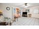 Living room with tiled floors and patio doors at 5030 Alderman Rd, Lakeland, FL 33810