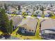 Aerial view of house showcasing backyard patio and surrounding landscape at 152 Travis Ln, Davenport, FL 33837