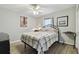 Bedroom with a full-size bed and a ceiling fan at 152 Travis Ln, Davenport, FL 33837