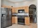 Modern kitchen with stainless steel appliances at 152 Travis Ln, Davenport, FL 33837