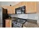 Kitchen with modern stove and microwave at 152 Travis Ln, Davenport, FL 33837