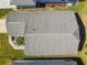 Grey asphalt shingle roof of one-story house at 152 Travis Ln, Davenport, FL 33837