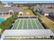 Community shuffleboard courts with covered seating area at 152 Travis Ln, Davenport, FL 33837