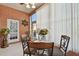 Peaceful sunroom with seating and access to outdoors at 152 Travis Ln, Davenport, FL 33837